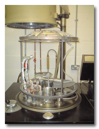 Coating chamber for thermal evaporation of dielectric ar coatings